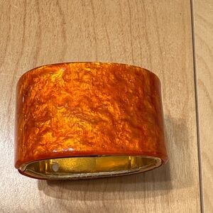 Vibrant orange jewel toned bracelet.  Band is 1-1/2” wide.